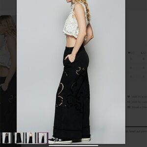 POL Black Wide-Leg Pants with Drawstring with Lazer Cut. Size large.